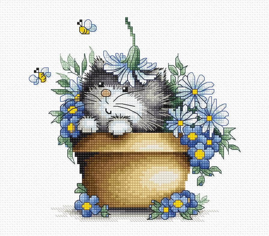 Kitten Among Flowers